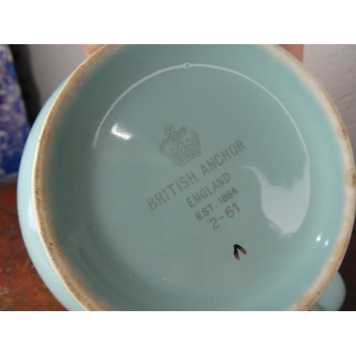 95 - A vintage Elijah Cotton floral jug, a pair of British Anchor blue glaze jugs and more.