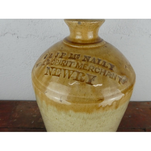 99 - A vintage J & J P McNally, Newry stoneware flagon, measuring 12