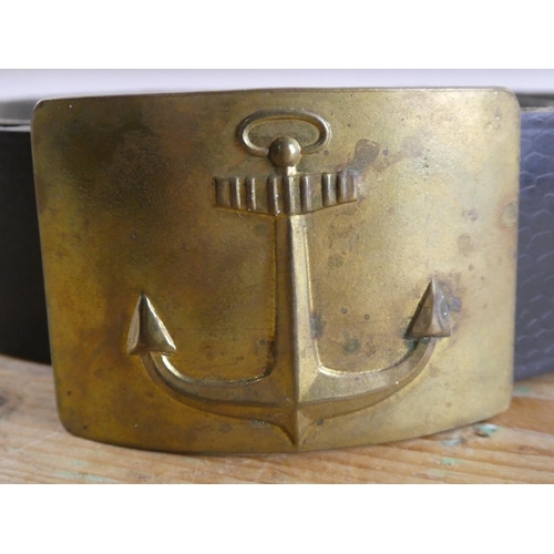 210 - A vintage Navy belt with brass buckle.