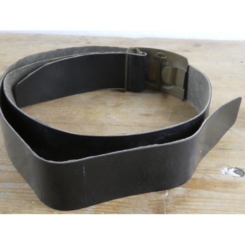 210 - A vintage Navy belt with brass buckle.