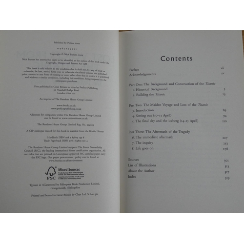 211 - A Belfast Telegraph 2012 commemorative medal celebrating Titanic 100th anniversary and a book 'Lost ... 