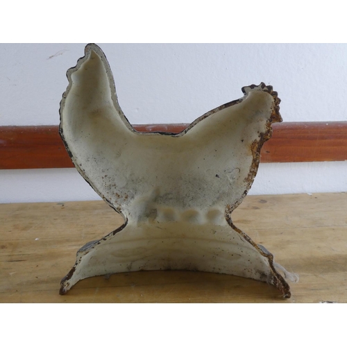 244 - A cast iron 'Hen' doorstop.