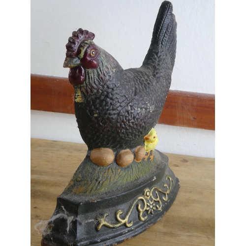 244 - A cast iron 'Hen' doorstop.