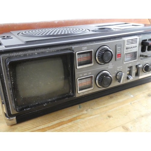 251 - A vintage Sharp radio, cassette and tv.