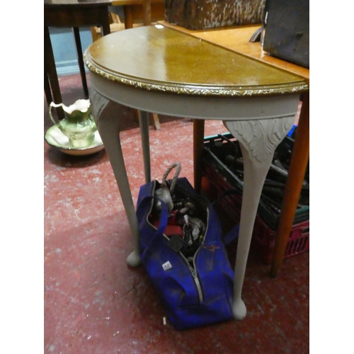 257 - A vintage upcycled demi lune table.