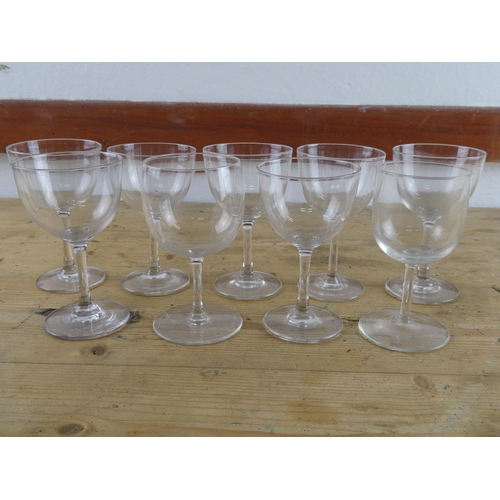 278 - A set of nine wine glasses.