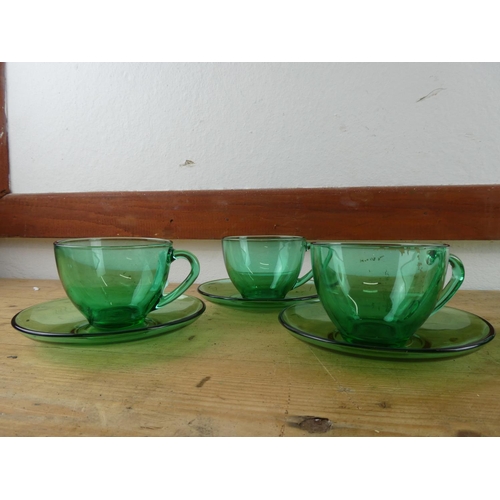 298 - A vintage 12 piece green glass tea set.