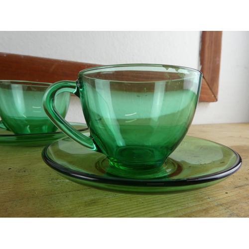 298 - A vintage 12 piece green glass tea set.