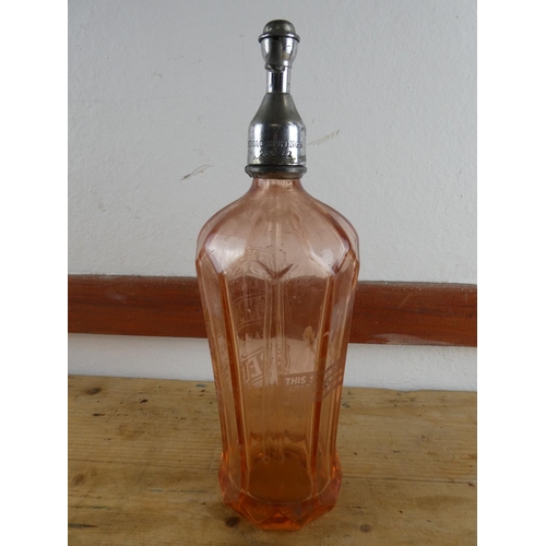 300 - An antique Briggs, Belfast coloured glass soda syphon.