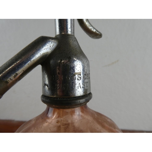 300 - An antique Briggs, Belfast coloured glass soda syphon.