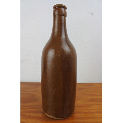 A stoneware bottle, reading, 
