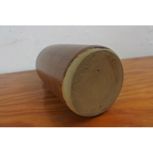 A stoneware bottle, reading, 