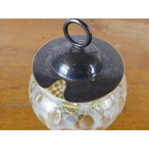 16 - An antique lidded glass preserve pot.