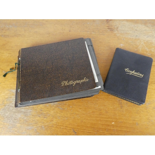 34 - An interesting antique leather bound book 'Confessions' and a vintage photograph and postcard album.