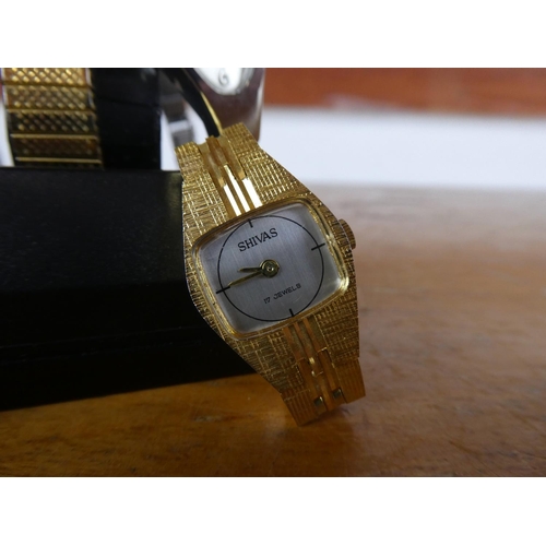 65 - A cased vintage Pulsar ladies wrist watch and three others.