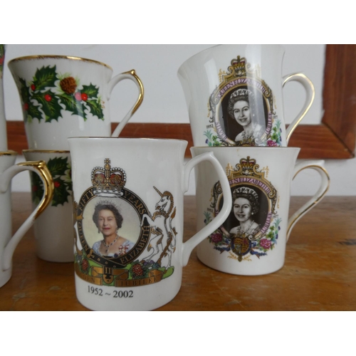 69 - A set of six Queens bone china 'Christmas' mugs and more.