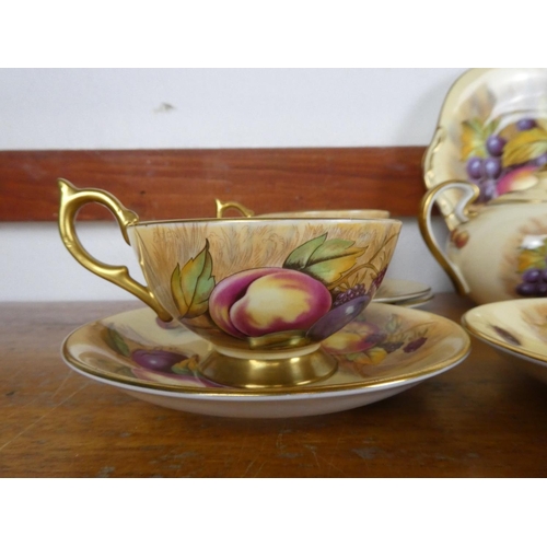 70 - A stunning collection of Aynsley 'Golden Orchard' bone china.