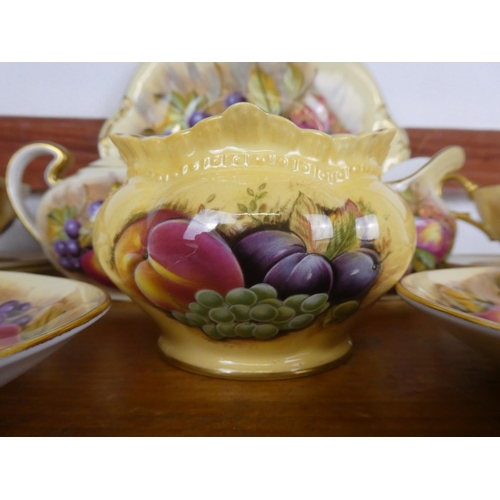 70 - A stunning collection of Aynsley 'Golden Orchard' bone china.