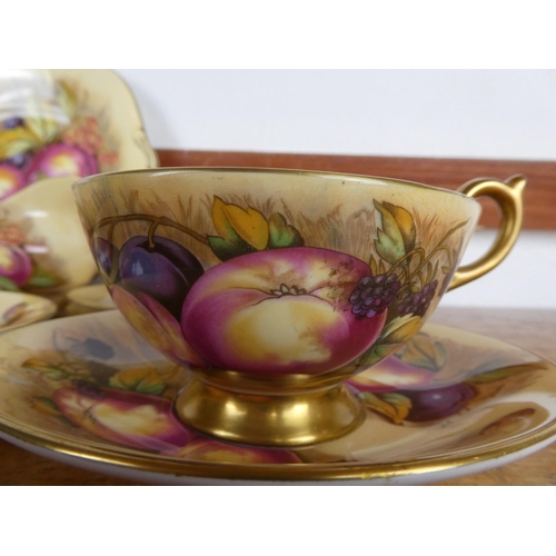 70 - A stunning collection of Aynsley 'Golden Orchard' bone china.