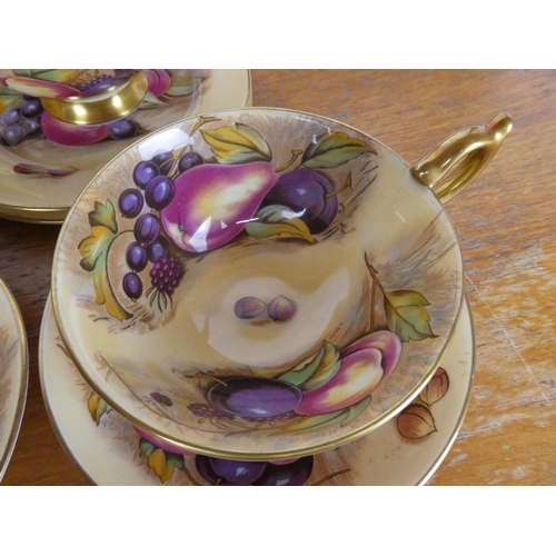 70 - A stunning collection of Aynsley 'Golden Orchard' bone china.