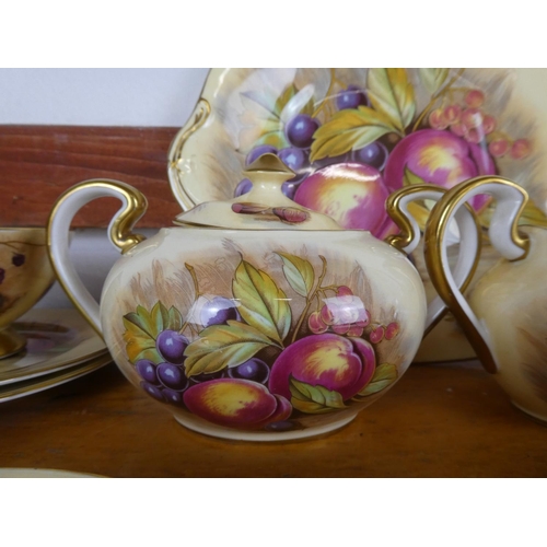 70 - A stunning collection of Aynsley 'Golden Orchard' bone china.