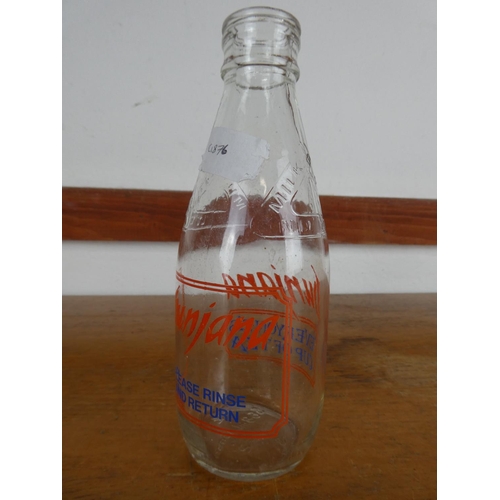 78 - A vintage Punjana milk bottle.