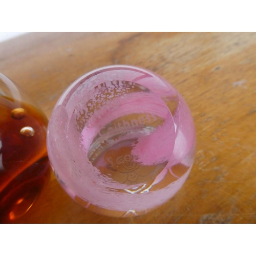 80 - Two Caithness crystal paperweights.