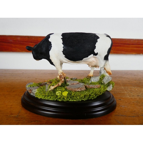 88 - A Country Artist figurine, 'Friesan Cow'.