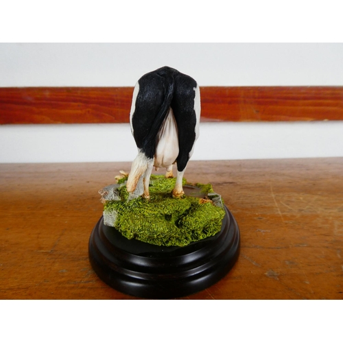 88 - A Country Artist figurine, 'Friesan Cow'.