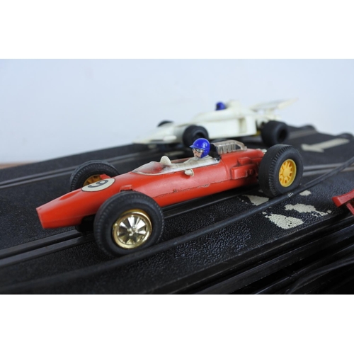 116 - A large lot of Scalextric racing track, cars etc.