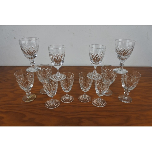 127 - Two sets of six Corbet crystal glasses.