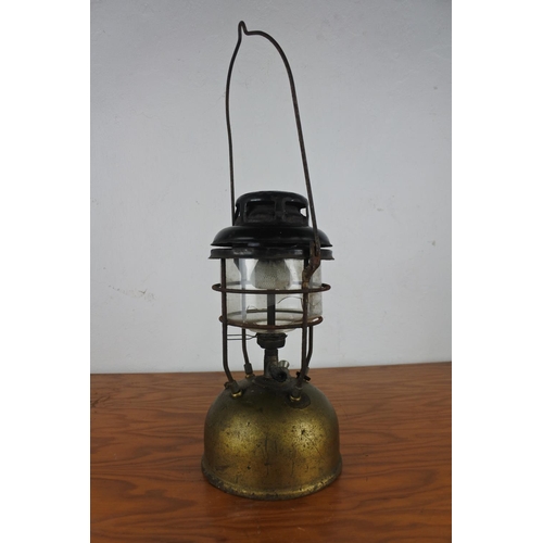 134 - A vintage brass tilley oil lamp (shade a/f).