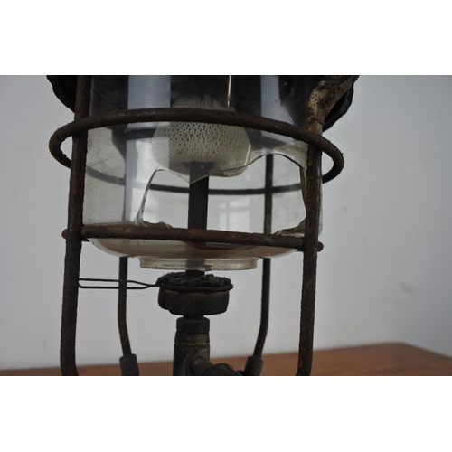 134 - A vintage brass tilley oil lamp (shade a/f).