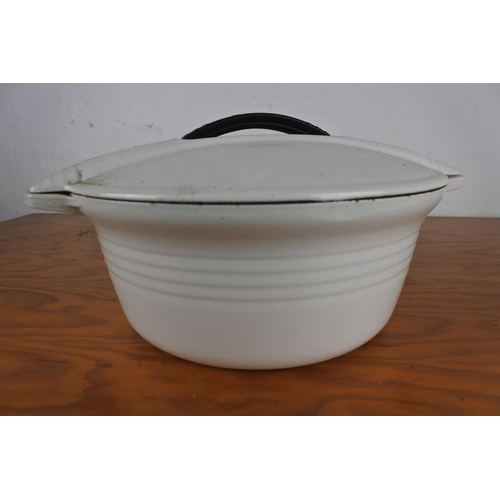 144 - A Le Creuset '26' lidded casserole dish.