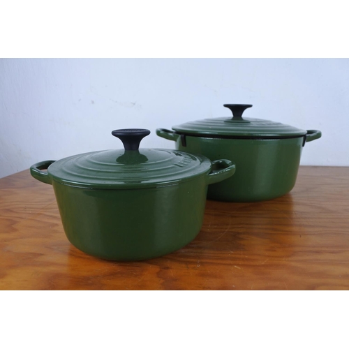 145 - Two lidded Le Creuset casserole dishes '18' and '24'.