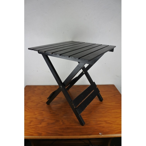 171 - A small folding table.