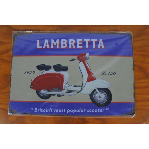 188 - A metal Lambretta sign and a BP Motor Oil sign.