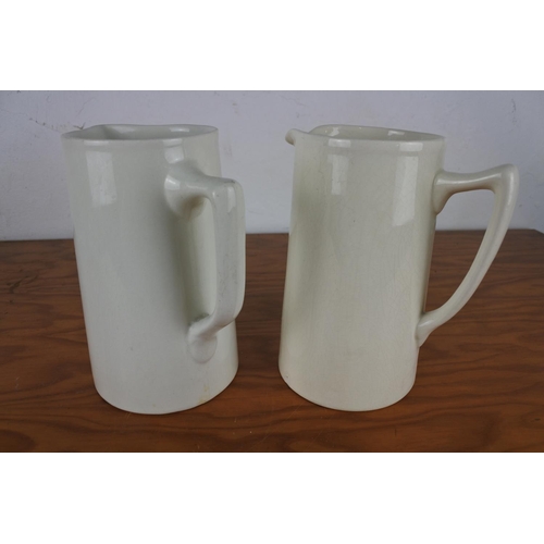 200 - A vintage Burlington jug (20cm) and another white jug (20cm).