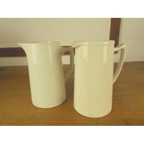 200 - A vintage Burlington jug (20cm) and another white jug (20cm).