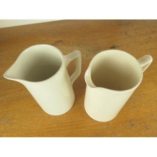 200 - A vintage Burlington jug (20cm) and another white jug (20cm).