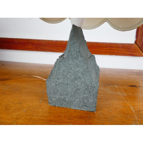 237 - An unusual stone table lamp, measuring 36cm tall.