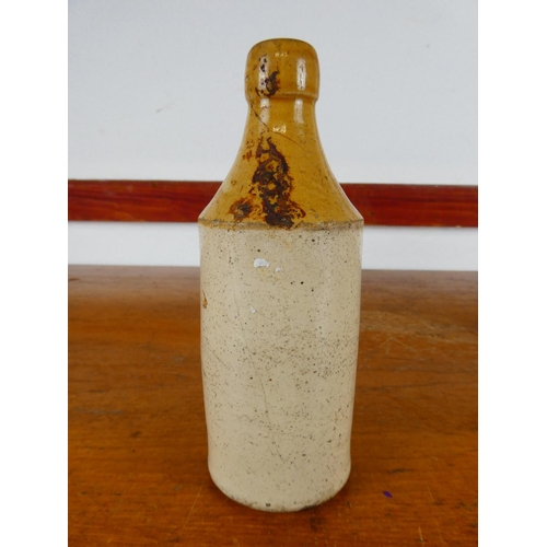 252 - An antique stoneware bottle, 'W.G.O'Doherty's bottling - Londonderry'.