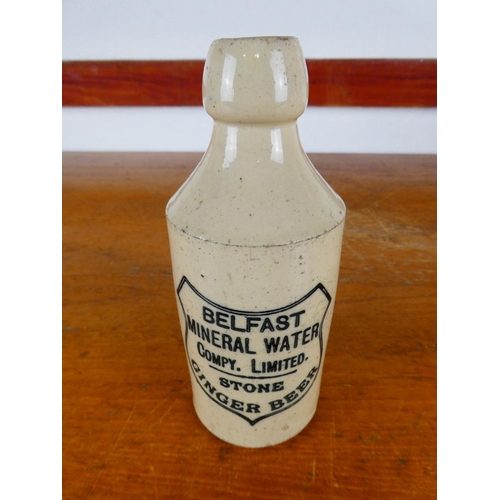 255 - An antique stoneware bottle, ' Belfast Mineral Water - Compy. Limited - Stone Ginger Beer'.