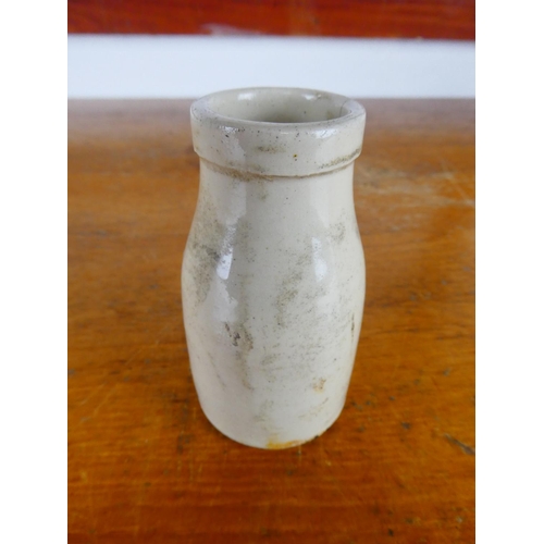 256 - An antique stoneware milk bottle, ' Ulster Diary Co - Belfast'.