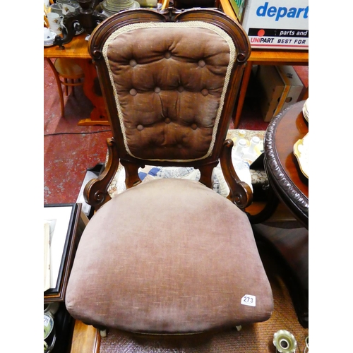 273 - An antique button backed chair.