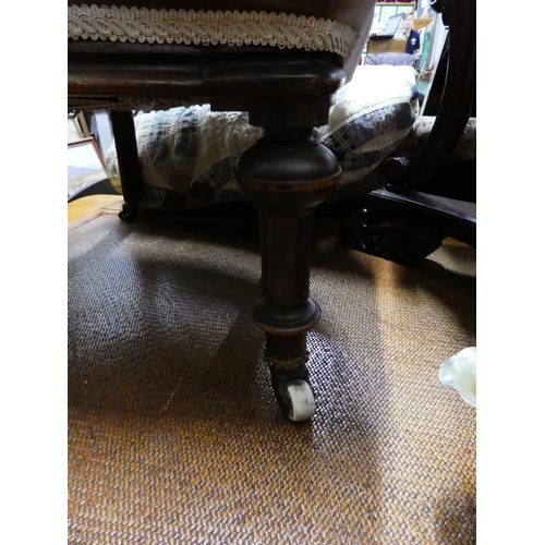 273 - An antique button backed chair.