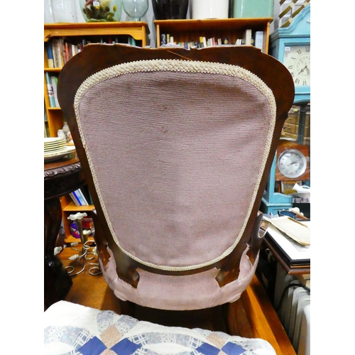 273 - An antique button backed chair.