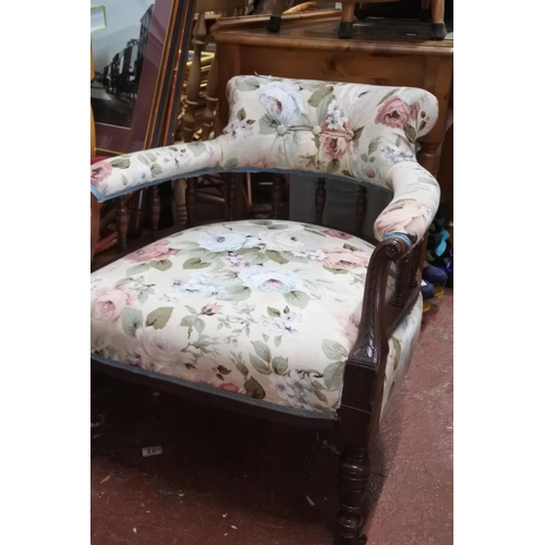 326 - An antique upholstered tub chair.