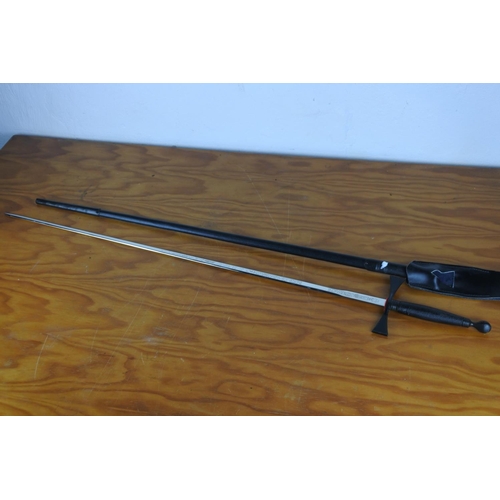 340 - A ceremonial sword, measuring 85cm long.