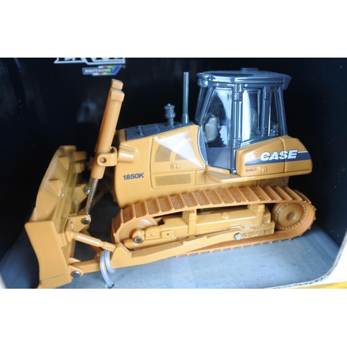 344 - A boxed ERTL Case 1850K Series III crawler dozer.